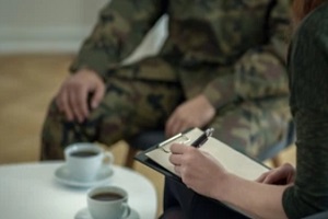 veteran having cup of coffee with hr