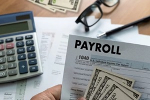payroll businessman working with PEO services